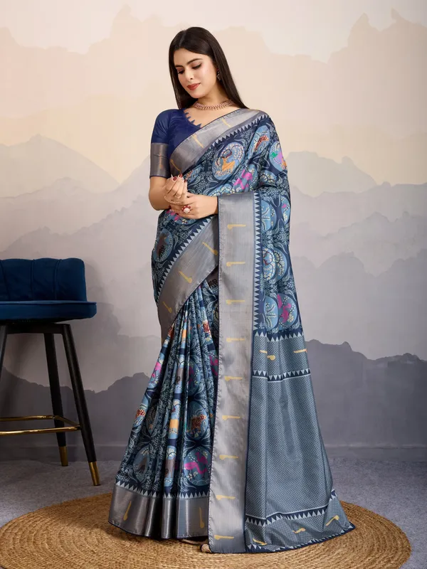 Elegant_Steel_Blue_Mriga_Patolsi_Dola_Satin_With_3D_Fauna_Print,_Zari_Patta_&_Designer_Tassels_Saree_For_Women