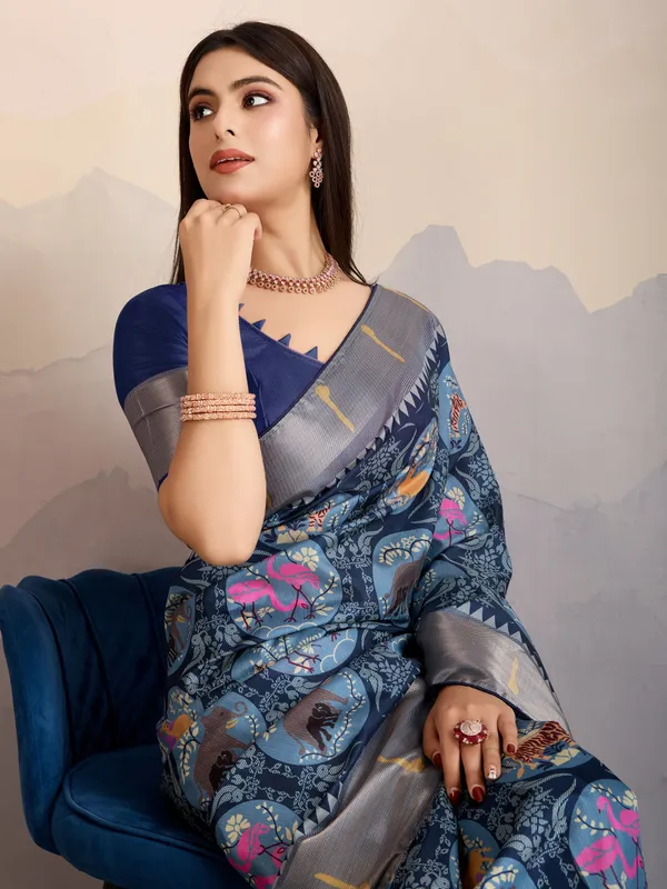 Elegant_Steel_Blue_Mriga_Patolsi_Dola_Satin_With_3D_Fauna_Print,_Zari_Patta_&_Designer_Tassels_Saree_For_Women