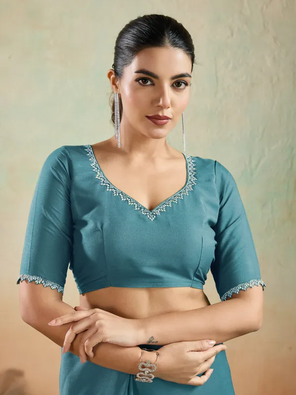 Teal_Blue_Matt_Georgette_Saree_With_Ceramic-Inspired_Embellished_Lace_For_Women