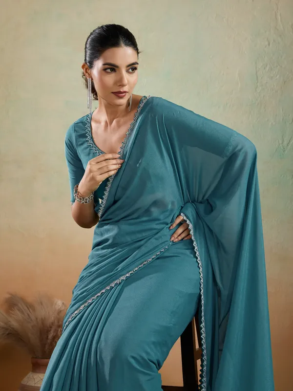 Teal_Blue_Matt_Georgette_Saree_With_Ceramic-Inspired_Embellished_Lace_For_Women