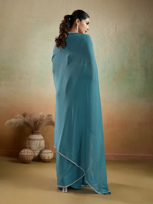 Teal_Blue_Matt_Georgette_Saree_With_Ceramic-Inspired_Embellished_Lace_For_Women