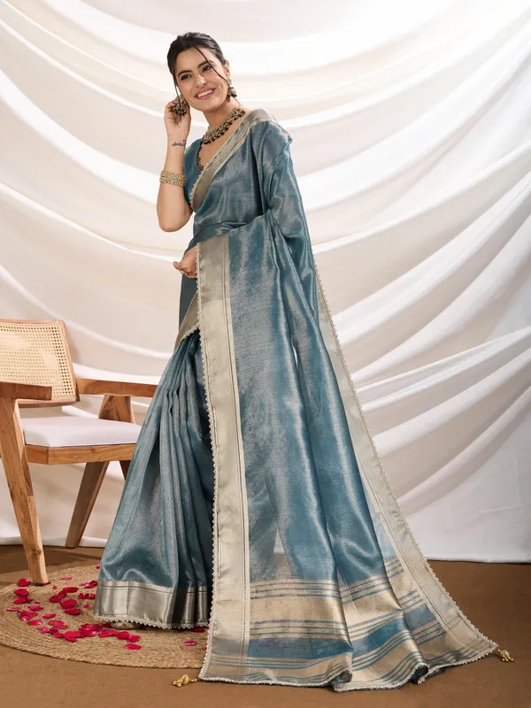 Icy_Teal_Blue_Linen_Tissue_Saree_with_Champagne_Gold_Zari_Border
