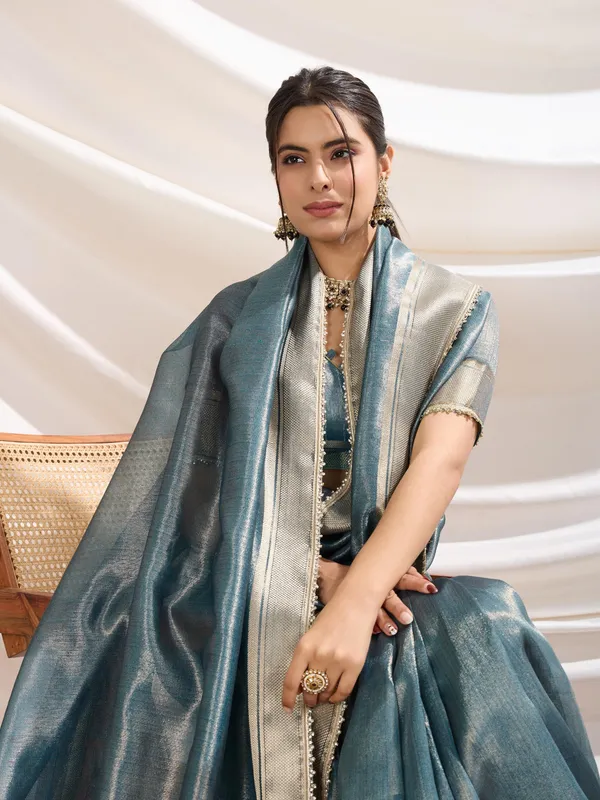 Icy_Teal_Blue_Linen_Tissue_Saree_with_Champagne_Gold_Zari_Border