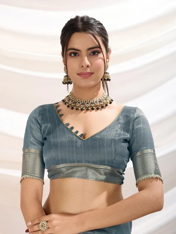 Icy_Teal_Blue_Linen_Tissue_Saree_with_Champagne_Gold_Zari_Border