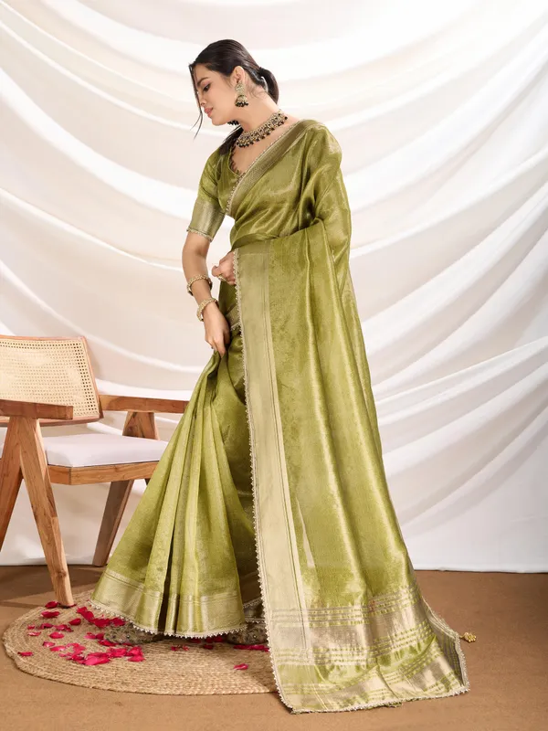 Olive_Green_Linen_Tissue_Saree_with_subtle_Zari_Border