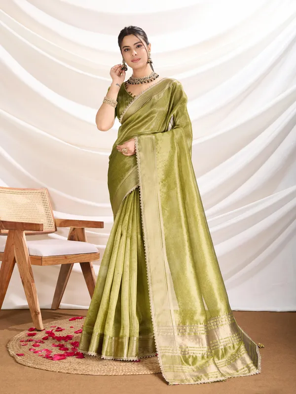 Olive_Green_Linen_Tissue_Saree_with_subtle_Zari_Border