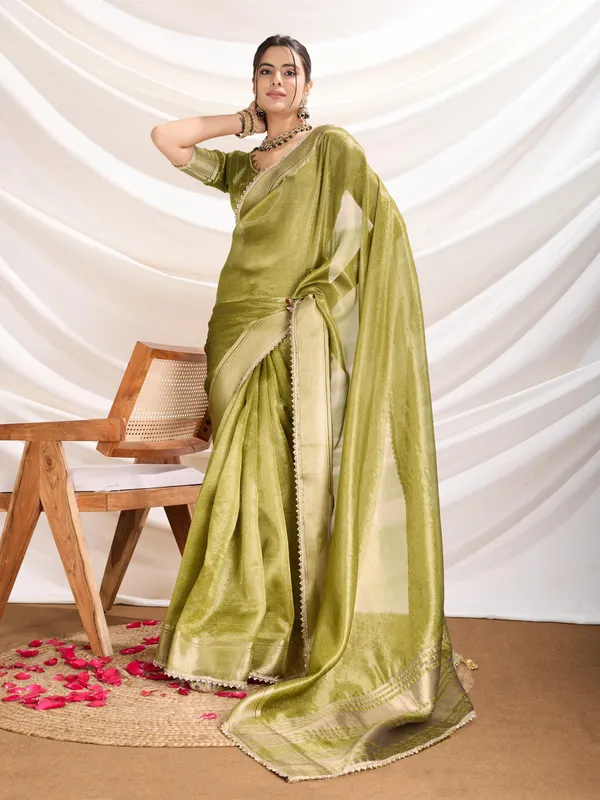 Olive_Green_Linen_Tissue_Saree_with_subtle_Zari_Border