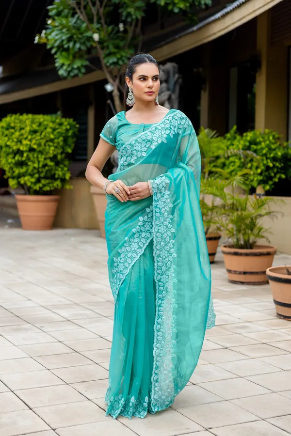 Elegant_Sea_Green_Twill_infused_Organza_Saree_with_White_Floral_Embroidery