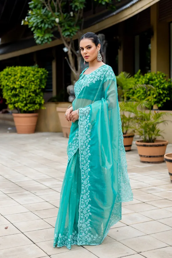 Elegant_Sea_Green_Twill_infused_Organza_Saree_with_White_Floral_Embroidery