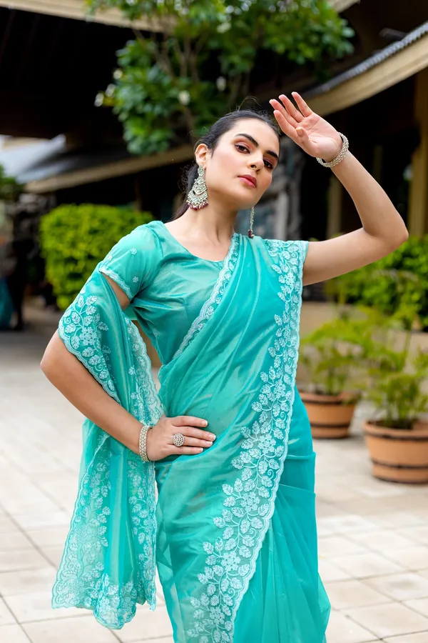 Elegant_Sea_Green_Twill_infused_Organza_Saree_with_White_Floral_Embroidery
