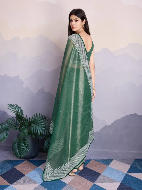 Teal_Green_Maharani_Style_Infused_Twill_Net_In_Shiny_Saree