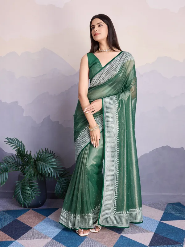 Teal_Green_Maharani_Style_Infused_Twill_Net_In_Shiny_Saree