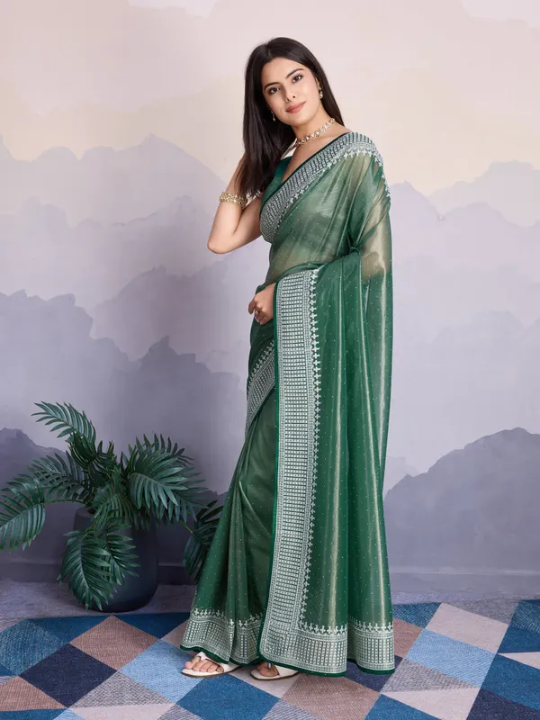 Teal_Green_Maharani_Style_Infused_Twill_Net_In_Shiny_Saree