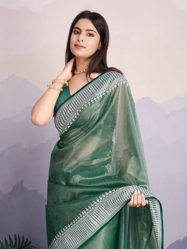 Teal_Green_Maharani_Style_Infused_Twill_Net_In_Shiny_Saree