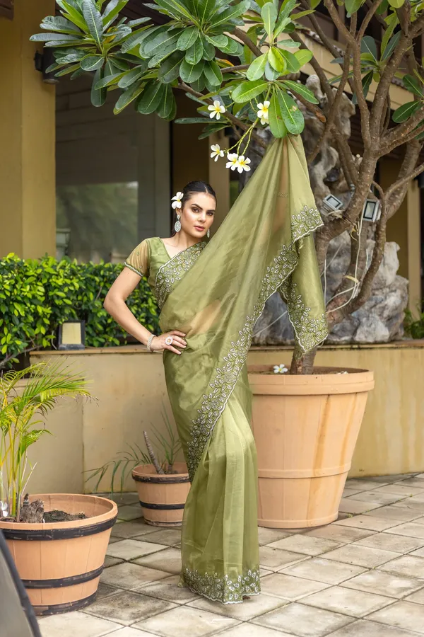 Elegant_Sage_Green_Twill_infused_Organza_Saree_with_Silver_Floral_Embroidery