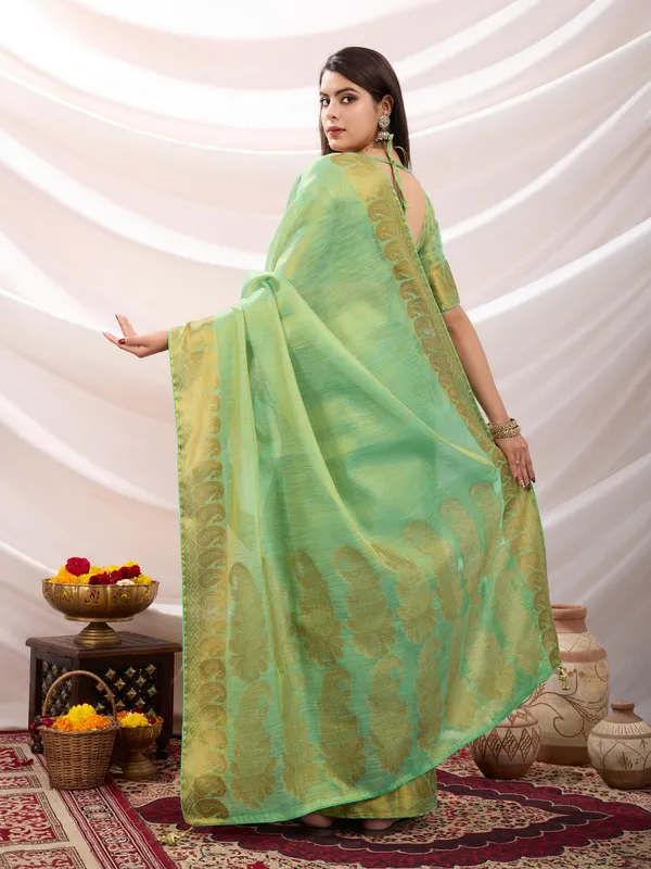Pastel_Green_Linen_Tissue_With_Golden_Zari_Weaving_Designer_Blouse_&_Tassels_Saree
