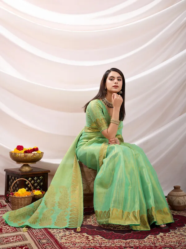Pastel_Green_Linen_Tissue_With_Golden_Zari_Weaving_Designer_Blouse_&_Tassels_Saree