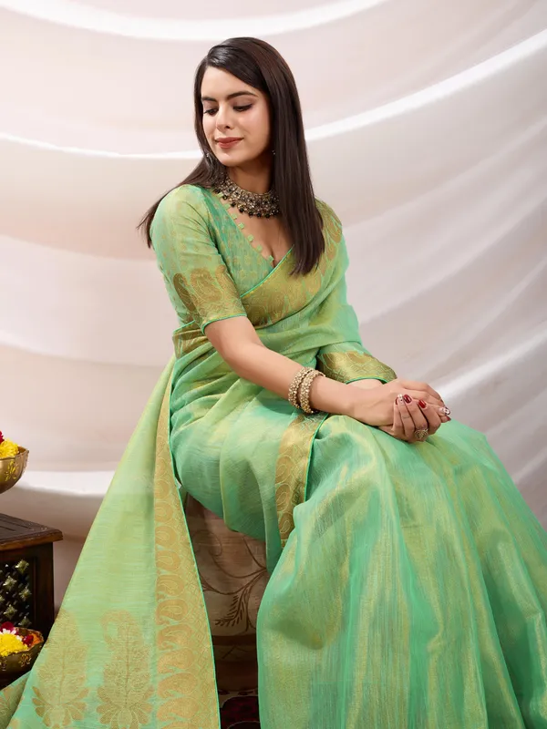Pastel_Green_Linen_Tissue_With_Golden_Zari_Weaving_Designer_Blouse_&_Tassels_Saree