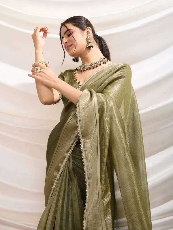 Rich_Henna_Green_with_radiant_gold_Infused_Tissue_Linen_Saree_For_Women