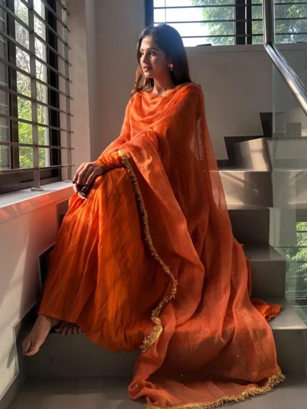 Orange_Muslin_Kurta_With_Muslin_Pant_And_Chinnon_Dupatta_Sets_For_Women