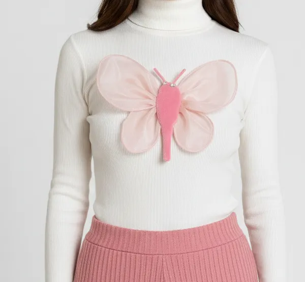 Baby_pink_butterfly_embossed_on_white_turttle_neck