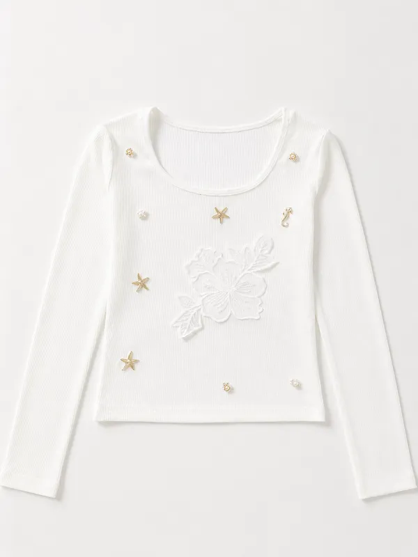 White_charms_with_hand_work_flower_crop_top