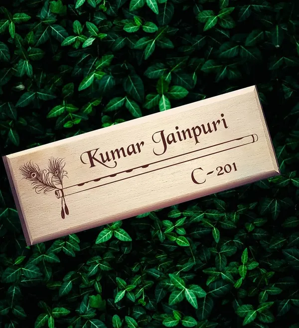 Brown_customizable_Ganesha_Wooden_Engraved_House_Name_Plate_(Krishna_Flute_Design)