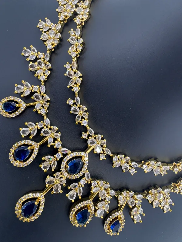 Elegant_Floral_Necklace_Set_with_Navy_Blue_Stones