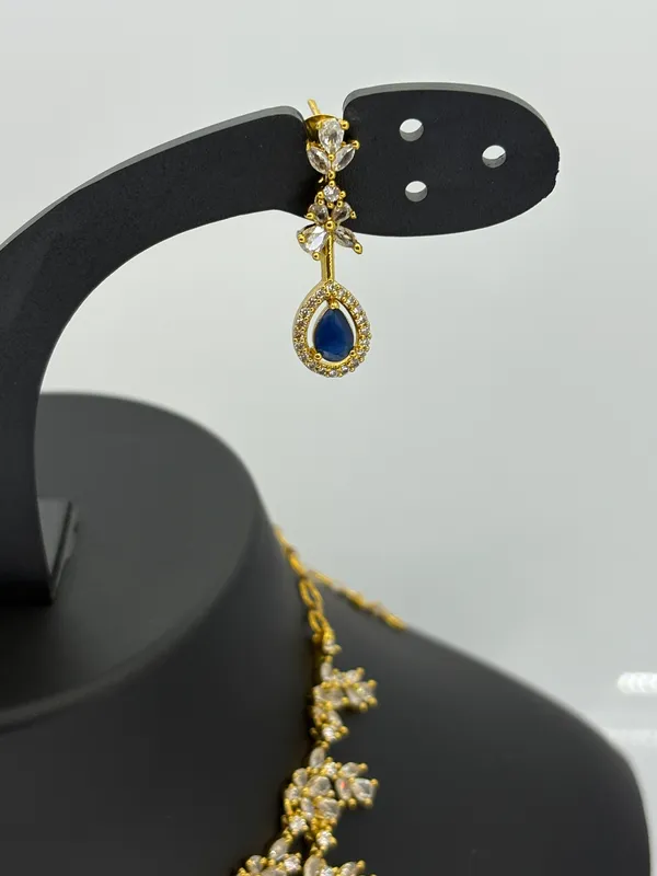 Elegant_Floral_Necklace_Set_with_Navy_Blue_Stones