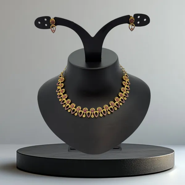 Elegant_Gold-Plated_Ruby_Stone_Necklace_Set_with_Heart-Shaped_Earrings