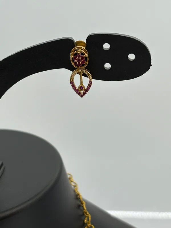 Elegant_Gold-Plated_Ruby_Stone_Necklace_Set_with_Heart-Shaped_Earrings