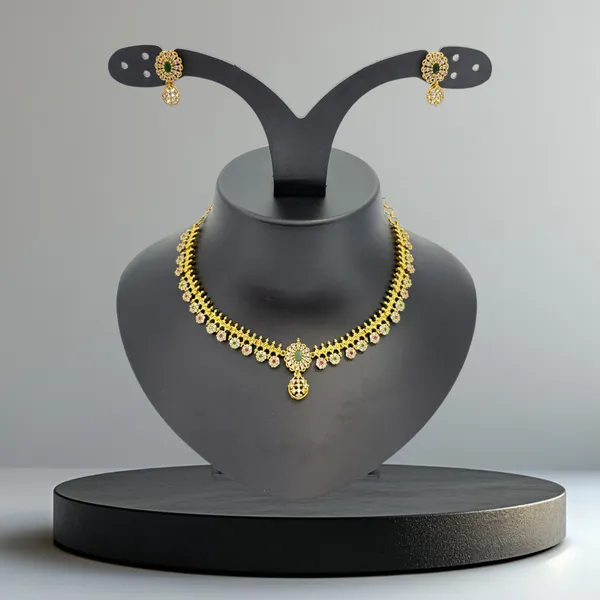 Floral_AD_Necklace_Set_in_Matte_Gold_Finish_with_Green_&_White_Stone_Detailing
