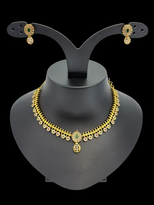 Floral_AD_Necklace_Set_in_Matte_Gold_Finish_with_Green_&_White_Stone_Detailing