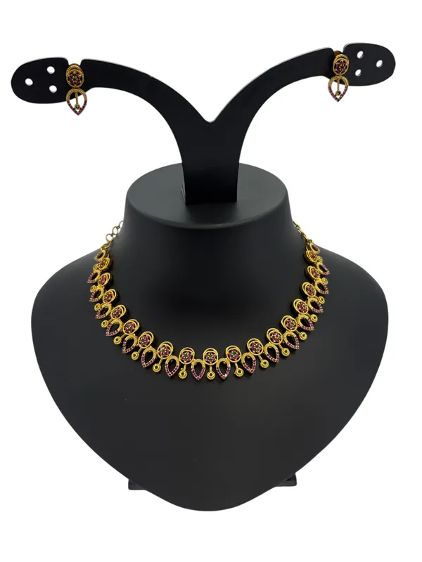 Elegant_Gold-Plated_Ruby_and_Green_Stone_Necklace_Set_with_Heart-Shaped_Earrings