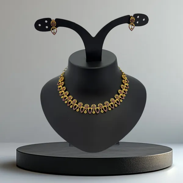 Elegant_Gold-Plated_Ruby_and_Green_Stone_Necklace_Set_with_Heart-Shaped_Earrings