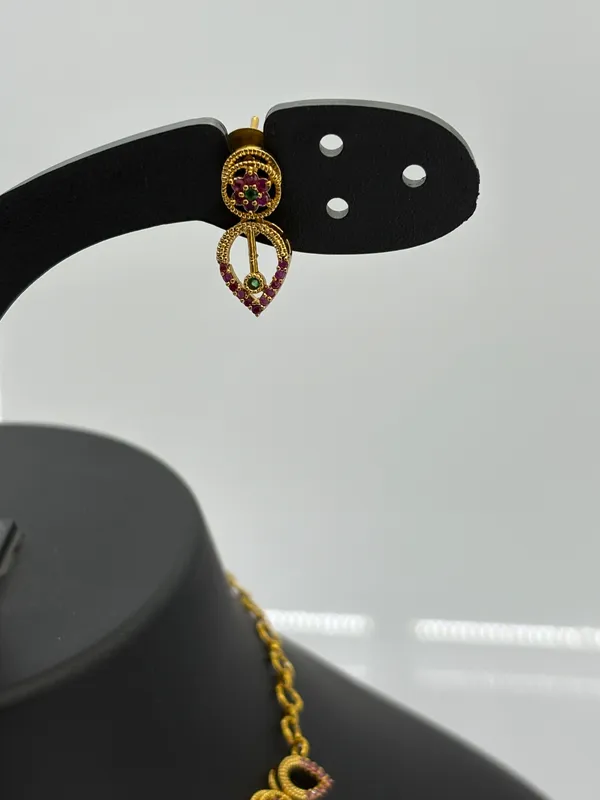 Elegant_Gold-Plated_Ruby_and_Green_Stone_Necklace_Set_with_Heart-Shaped_Earrings