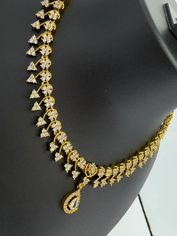 Elegant_Teardrop_AD_Necklace_Set_in_Gold_Finish