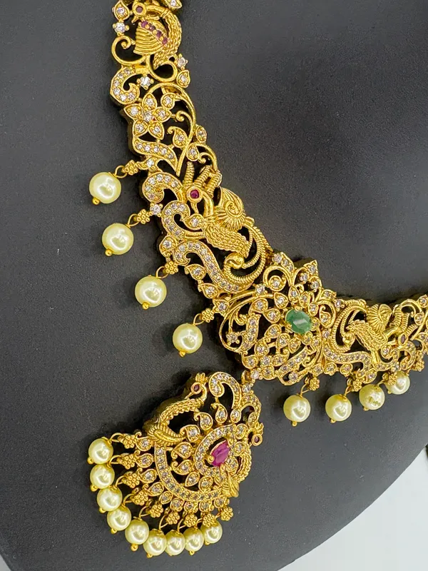 Gold_Finish_AD_Necklace_Set_with_Ruby_&_Green_Stone_Accents