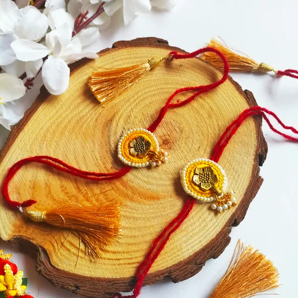 Red_Gold_Moksha_Rakhi_Bond_&_Blessings