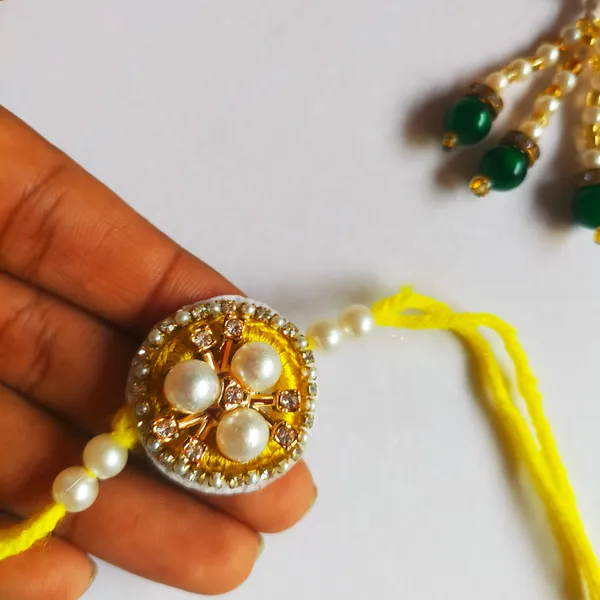 Yellow_Charvitha_Rakhi_Bond_&_Blessings