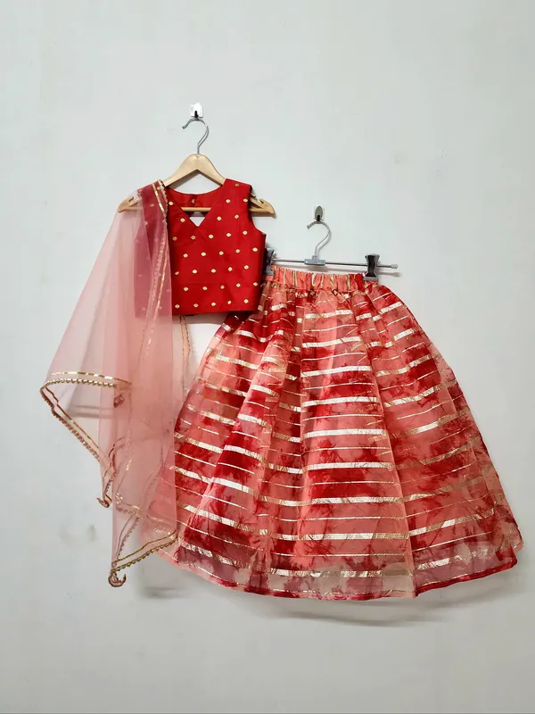 Red_Tissue_And_Silk_Festive_Lehenga_For_Girls