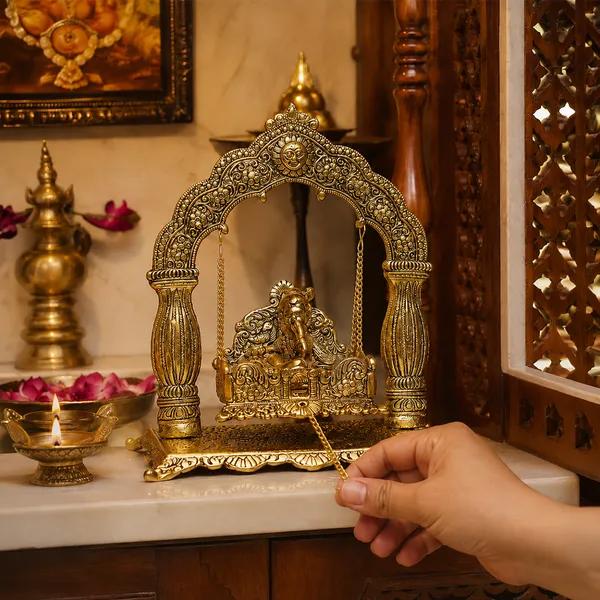 Hastcraft_Metal_Jhula_Arched_frame_Pillars_with_Laddu_Gopal_Idol,_Jhula_for_Home_Temple_&_Pooja_Room_|_Traditional_Golden_Finish_I_Festive_&_Religious_Décor