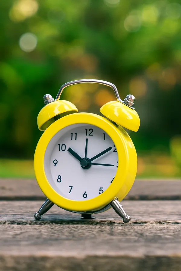 Yellow_Metal_Mini_Alarm_Clock__Compact_twin_bell_alarm_with_classic_quartz_movement