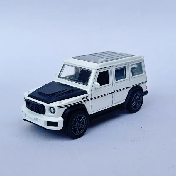 Metal_Toy_Car_Suv_G_Wagon_With_Openable_Doors,_High_Speed_Car_With_Pull_Back,_Openroof_Dual_Tone_Thar_Jeep_Car_For_Kids._(Size_1:32)