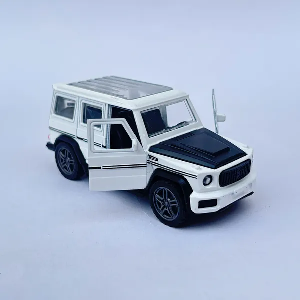 Metal_Toy_Car_Suv_G_Wagon_With_Openable_Doors,_High_Speed_Car_With_Pull_Back,_Openroof_Dual_Tone_Thar_Jeep_Car_For_Kids._(Size_1:32)