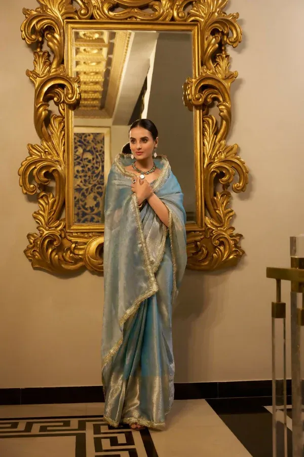 Ocean_Blue_Tissue_Shimmer_Zari_Woven_Saree_with_Sequined_Lace_&_Unstitched_Blouse_–_Sea_Blue_Elegance