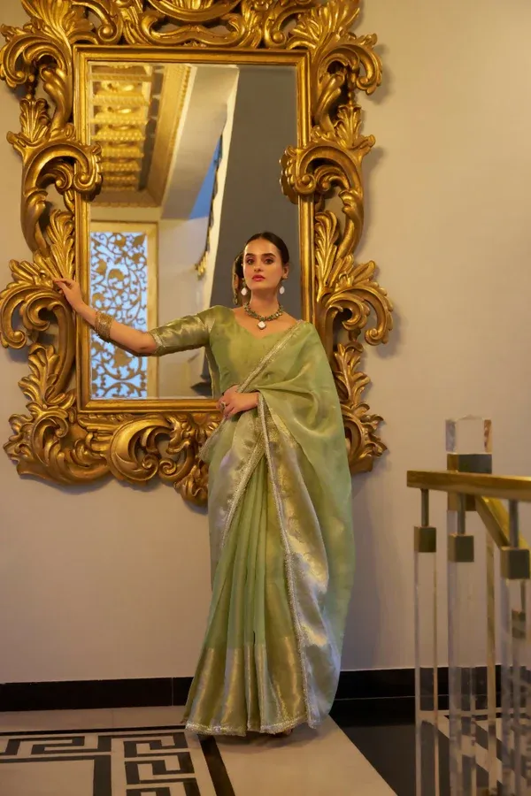 Pista_Green_Tissue_Shimmer_Zari_Woven_Saree_with_Sequined_Lace_&_Unstitched_Blouse_–_Pastel_Elegance