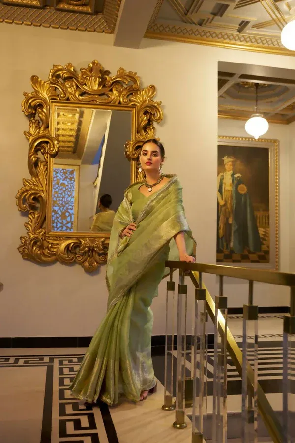Pista_Green_Tissue_Shimmer_Zari_Woven_Saree_with_Sequined_Lace_&_Unstitched_Blouse_–_Pastel_Elegance