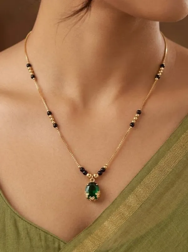 Elegant_Gold-Plated_Mangalsutra_with_Green_Stone_Pendant_for_Women