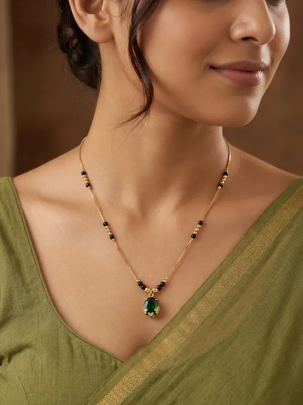 Elegant_Gold-Plated_Mangalsutra_with_Green_Stone_Pendant_for_Women